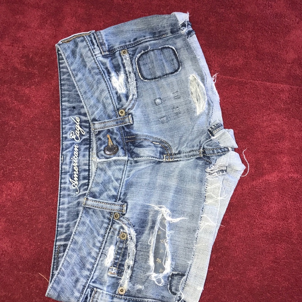 Distressed denim shorts